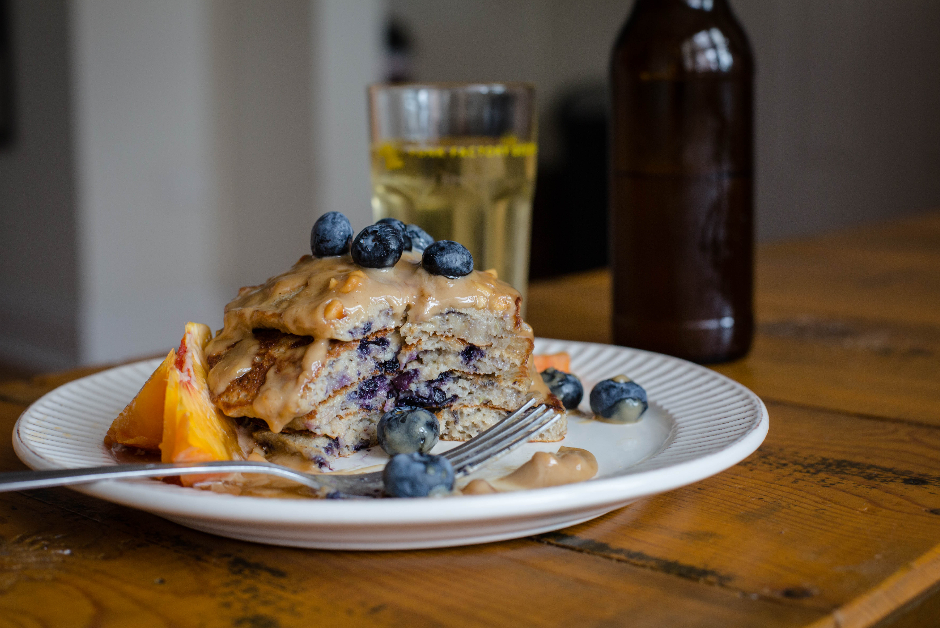 blueberry oatmeal pancakes with peanut butter sauce